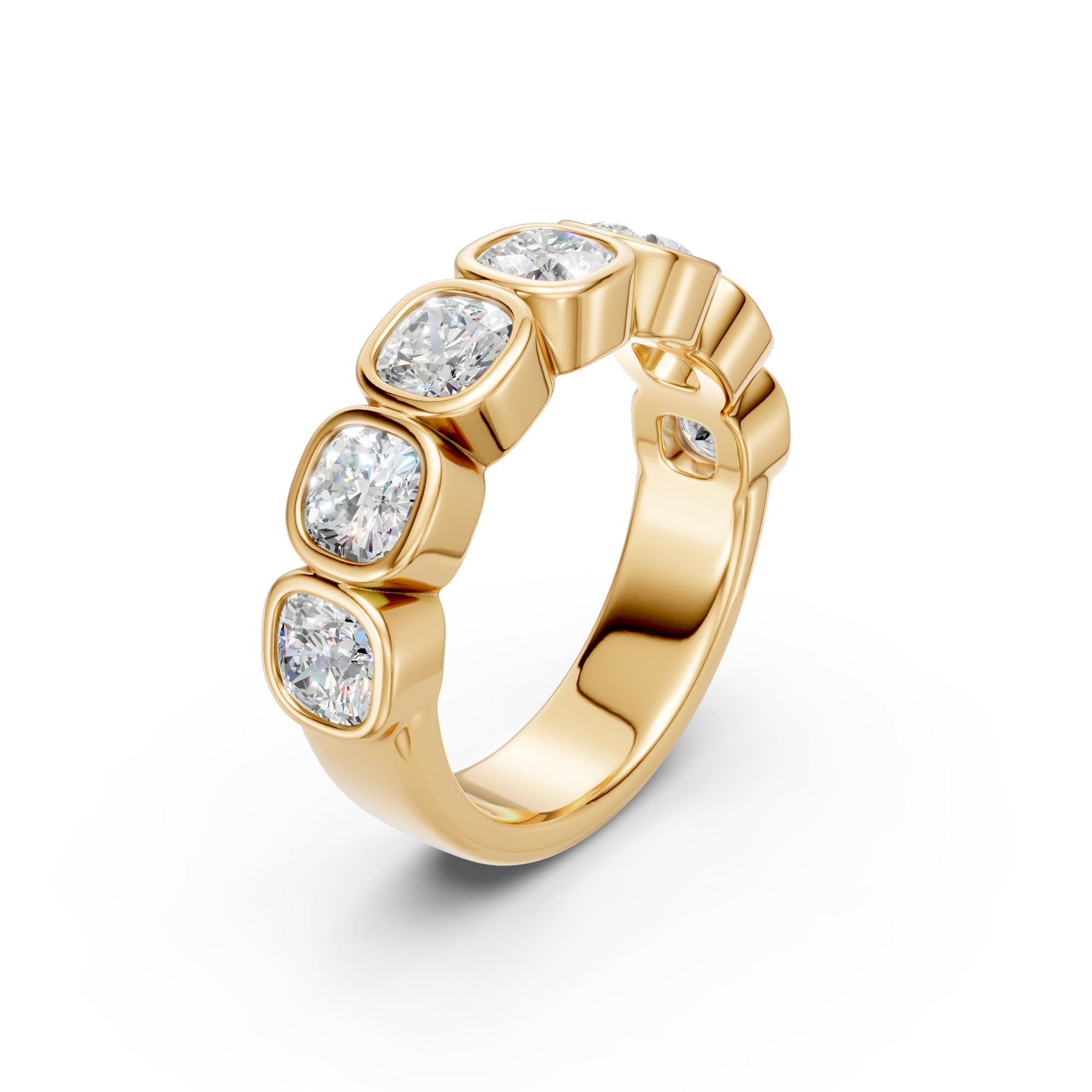 Angled close-up of the yellow gold Seven-Stone Cushion Bezel Band, showing seven cushion-cut diamonds in smooth full bezel settings.