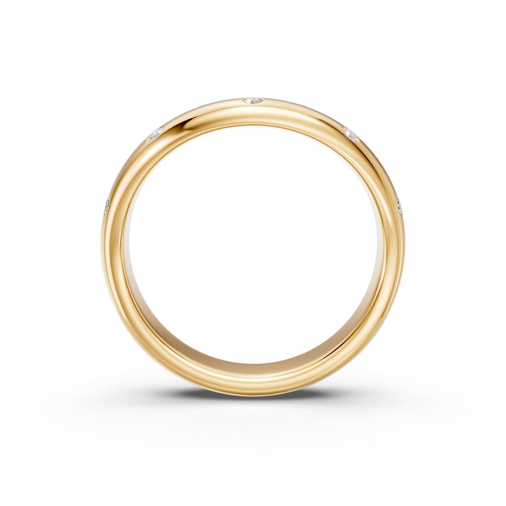 Angled detail of the yellow gold Eleven Flush Diamond Nesting Arc Band showing its centred curved profile