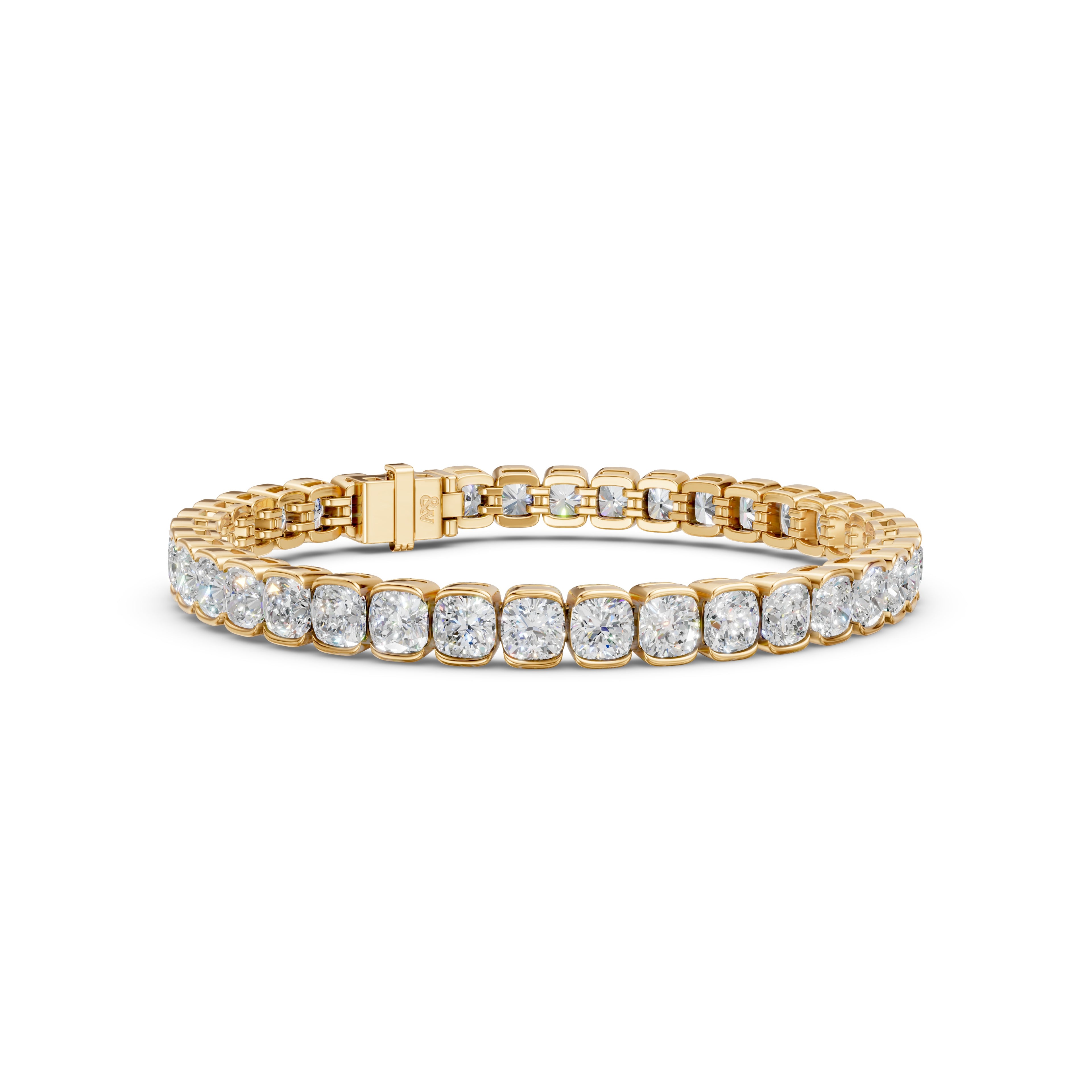 Yellow gold cushion diamond tennis bracelet showing partial-bezel setting and hidden clasp