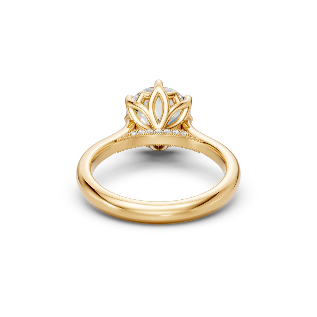 Rear underside view of the yellow-gold round ring showing the floral tulip basket and pavé bridge