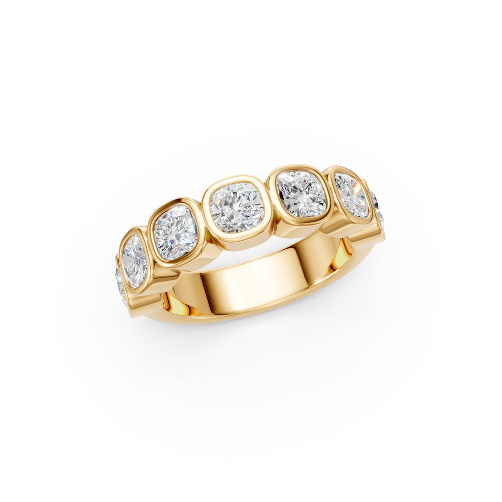 Side-profile view of the yellow gold Seven-Stone Cushion Bezel Band, showing the low-set diamonds and substantial polished band.