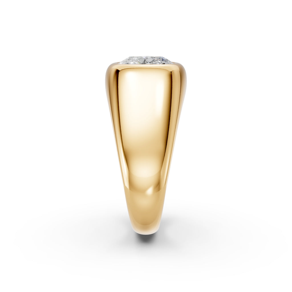 End-on view of the yellow gold East–West Cushion Signet, showing the broad solid shoulder, tapered band, and low-set diamond profile.