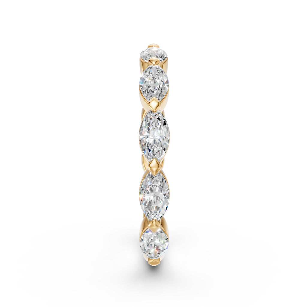 Side profile showing the marquise diamonds and diamond-shaped prongs