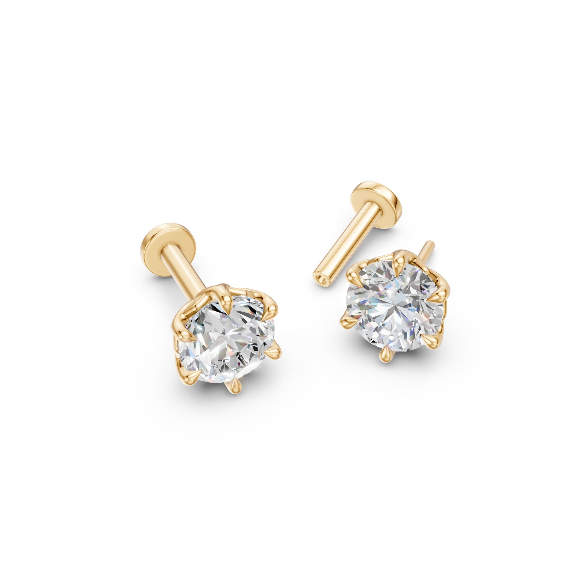 Angled overhead view of Lotus round diamond studs in 14K yellow gold with sculpted six-petal settings.
