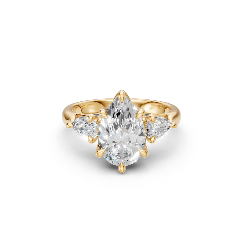 Front view of the Pear Three-Stone Low-Profile Cathedral Ring in yellow gold with three pear-cut lab-grown diamonds