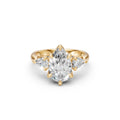 Front view of the Pear Three-Stone Low-Profile Cathedral Ring in yellow gold with three pear-cut lab-grown diamonds