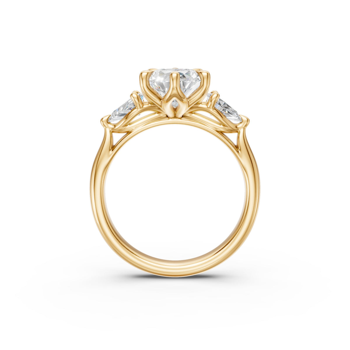 Side profile of the pear three-stone cathedral ring showing its low-set design and sculptural gallery