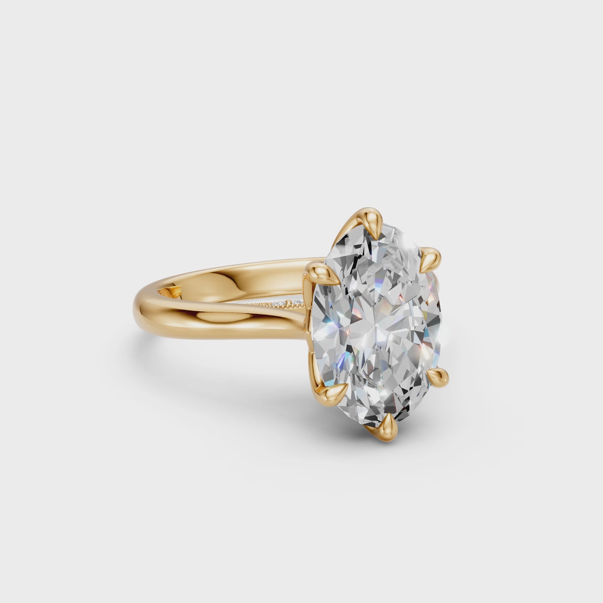 Oval lab-grown diamond tulip cathedral ring in yellow gold with a seven-diamond pavé bridge