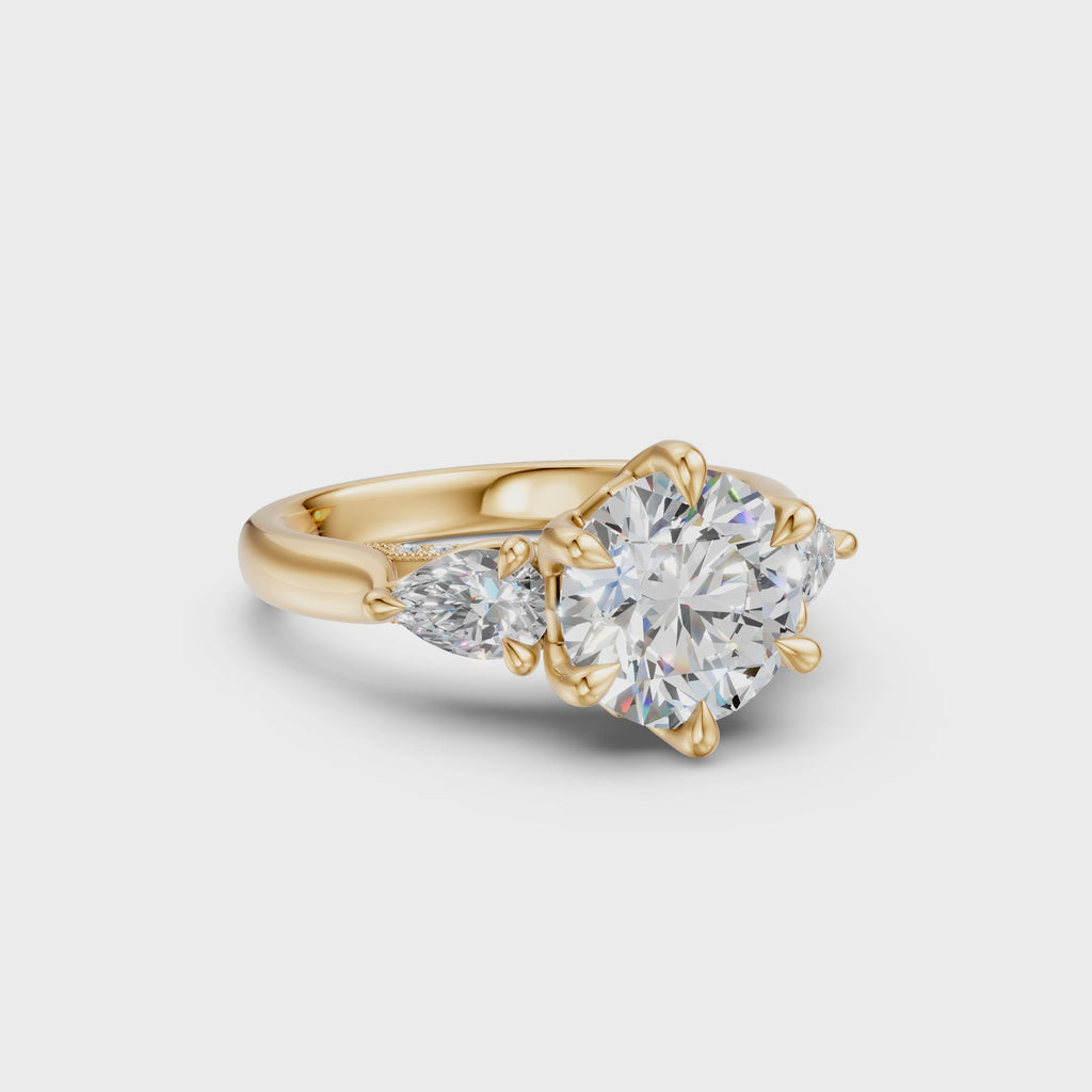Round & Pear Three-Stone Cathedral Ring