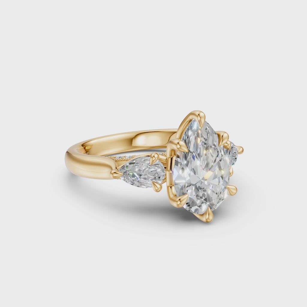 Pear Three-Stone Cathedral Ring