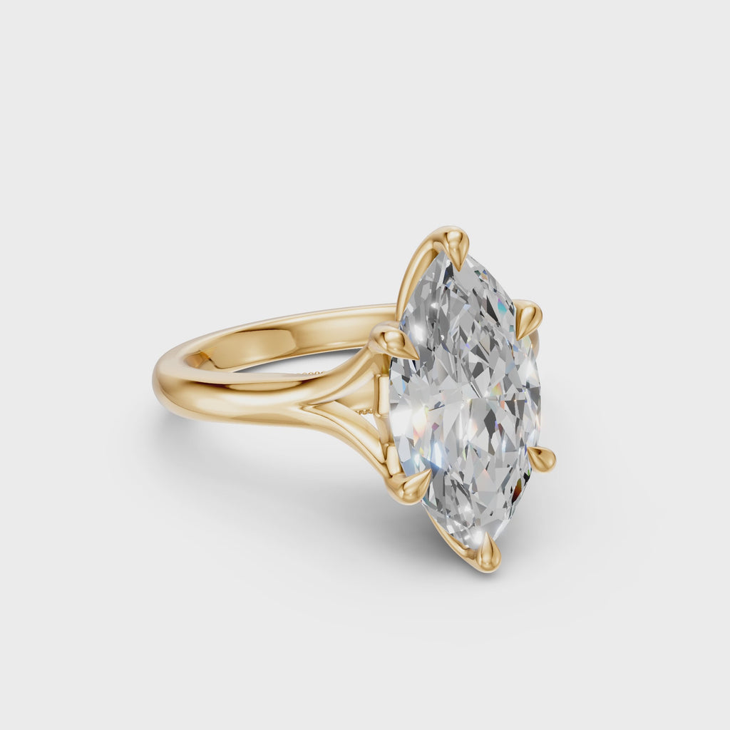 Marquise Tulip Split Cathedral Ring in yellow gold, showing the six-prong tulip setting, split cathedral shoulders and pavé diamond bridge.