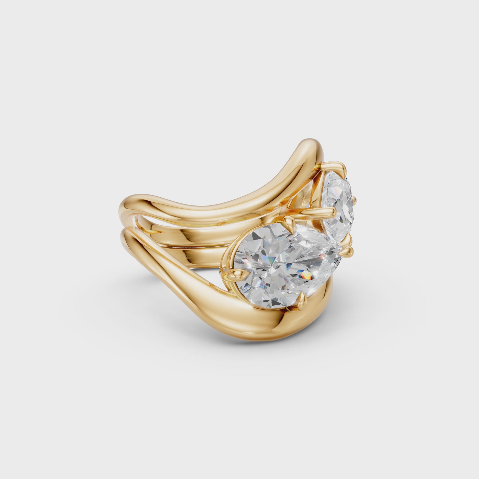 TWIN RINGS, PEAR CUT