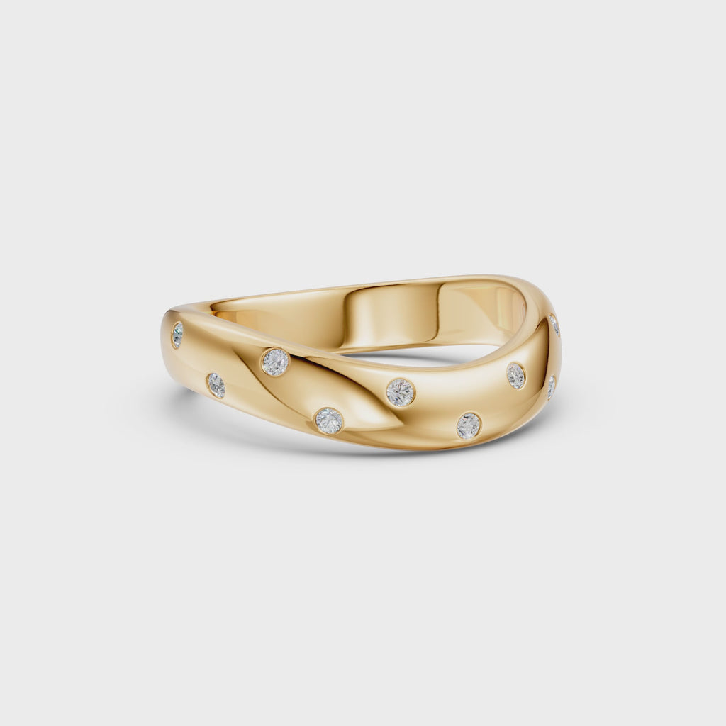 Rotating view of the yellow gold Eleven Flush Diamond Nesting Arc Band showing its centred curved profile, flush-set round diamonds and comfort-fit interior