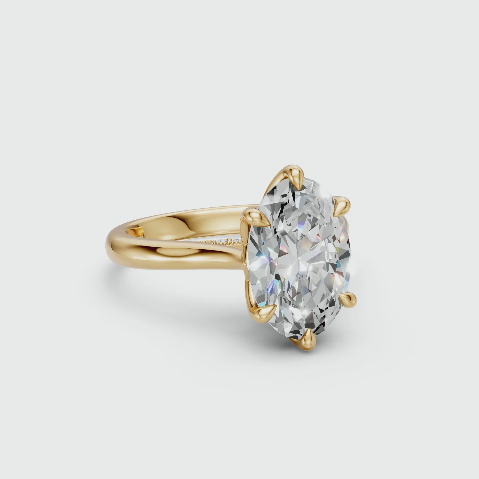 Oval lab-grown diamond tulip cathedral ring in yellow gold with a seven-diamond pavé bridge